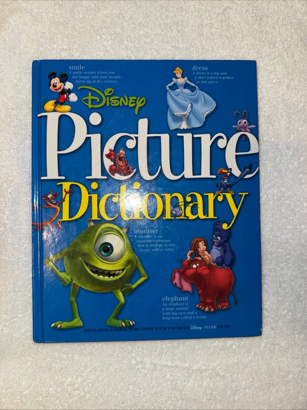 Disney Blue Picture Dictionary with Yellow Title and Colorful Characters